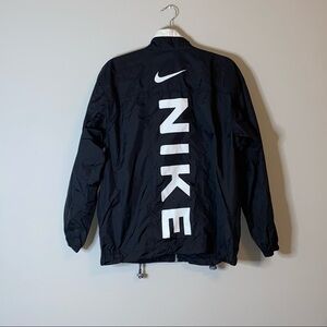 NIKE VTG Swoosh Vertical Spell Out Windbreaker